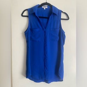 Blue sleeveless button up shirt